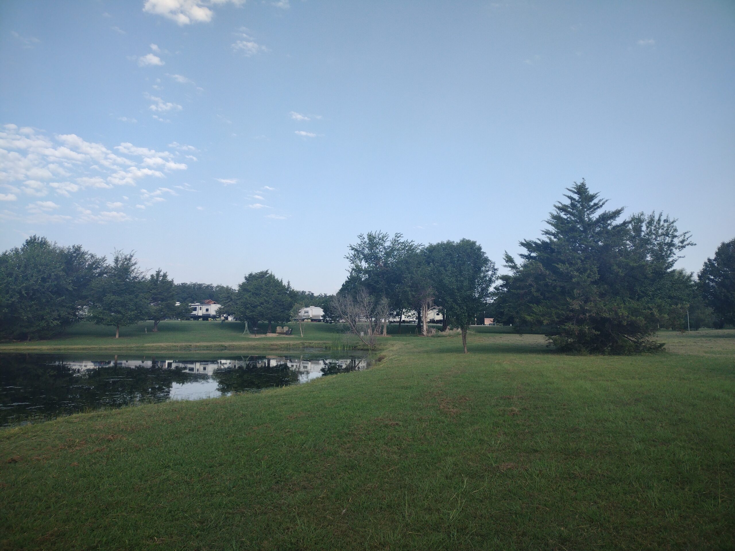 Cedar Crest RV Park Pond and Rvs 2